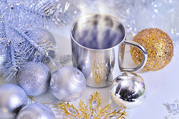 Image showing Christmas decorations with a mug of hot coffee