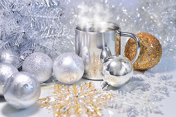 Image showing Christmas decorations with a mug of hot coffee