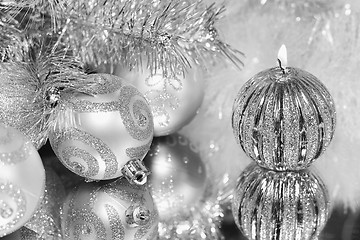 Image showing Christmas decorations with candle and silver balls.