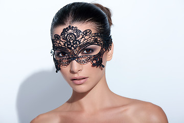 Image showing Woman with evening smokey makeup and black lace mask