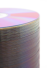 Image showing Purple CDs on spindle