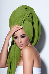 Image showing Woman with smokey makeup and green turban