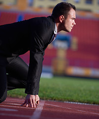 Image showing business man ready to sprint