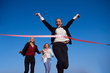 Image showing business people running on racing track