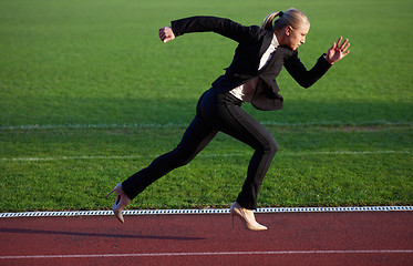 Image showing business man ready to sprint