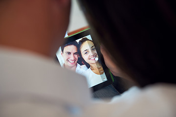 Image showing couple at modern home using tablet computer