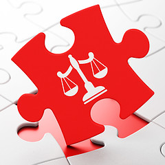 Image showing Law concept: Scales on puzzle background