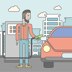 Image showing Man filling up fuel into car.