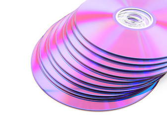 Image showing Stack of vibrant purple DVDs or CDs