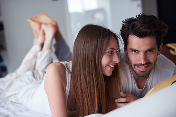 Image showing couple relax and have fun in bed