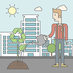 Image showing Man watering tree.