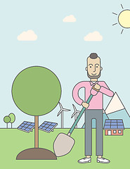 Image showing Man plants tree.