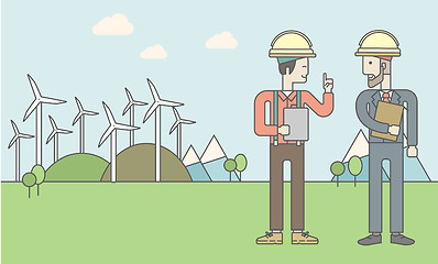 Image showing Two man with wind turbines.