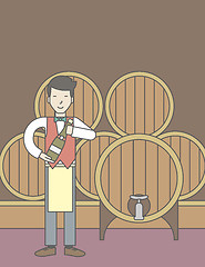 Image showing Waiter in wine cellar.