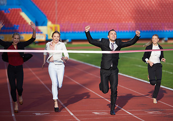 Image showing business people running on racing track