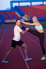 Image showing sporty woman on athletic race track