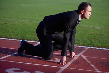 Image showing business man ready to sprint