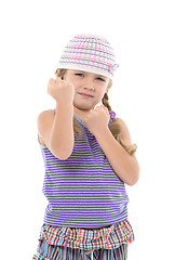 Image showing Little Girl in Bright Dress Shows Fists