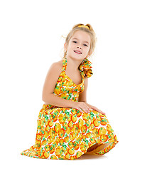 Image showing Little Girl in a Yellow Dress Posing