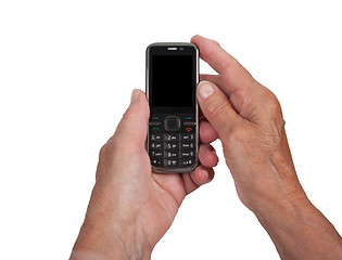 Image showing Hands of senior womanwith a mobile phone