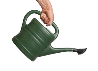 Image showing Hand holding green watering can