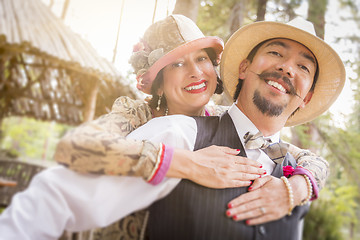 Image showing 1920s Dressed Romantic Couple Flirting Outdoors