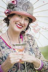 Image showing 1920s Dressed Girl with Parasol and Glass of Wine Portrait