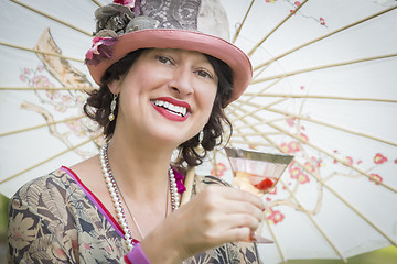 Image showing 1920s Dressed Girl with Parasol and Glass of Wine Portrait