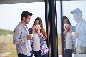 Image showing relaxet young couple drink first morning coffee