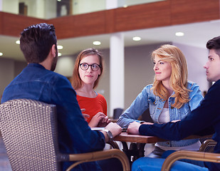 Image showing students group working on school  project  together