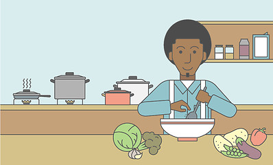 Image showing Man cooking meal.