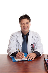 Image showing Doctor sitting at desk