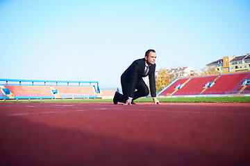 Image showing business man ready to sprint