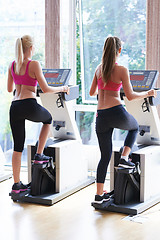 Image showing woman exercising on treadmill in gym