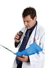 Image showing Doctor recording information