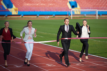 Image showing business people running on racing track