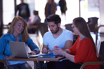 Image showing students group working on school  project  together