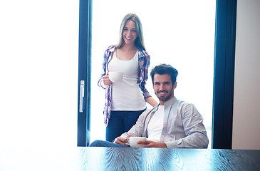 Image showing relaxet young couple drink first morning coffee