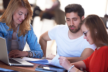 Image showing students group working on school  project  together