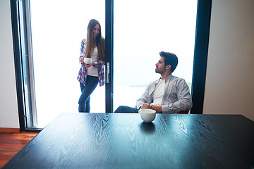 Image showing relaxet young couple drink first morning coffee