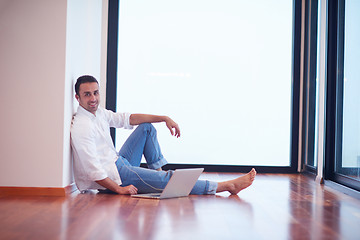 Image showing working on laptop computer from home