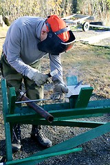 Image showing Worker welding steel