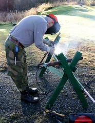 Image showing Worker welding steel