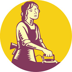 Image showing Housewife Ironing Circle Woodcut