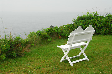 Image showing Bench on ocean shore