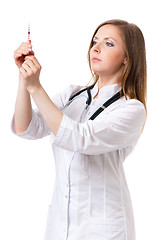 Image showing Beautiful young nurse with syringe