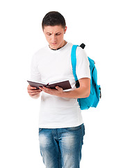 Image showing Boy student with backpack and notepad
