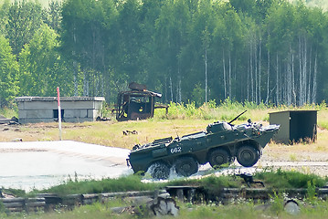 Image showing BTR-82A armoured personnel carrier goes from water