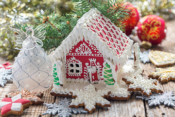 Image showing Christmas angel and a gingerbread house.