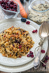 Image showing Rice with carrots, raisins and cranberries.